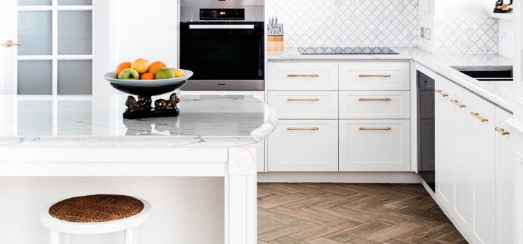 White Kitchen with Herringbone Flooring