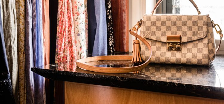 Walk in robe storage and louis vitton handbag