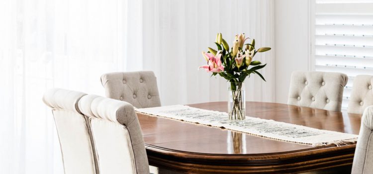Dining Room table with linen curtains
